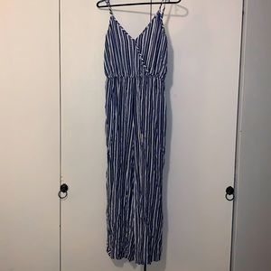 Vertical striped jumpsuit. Dark blue.